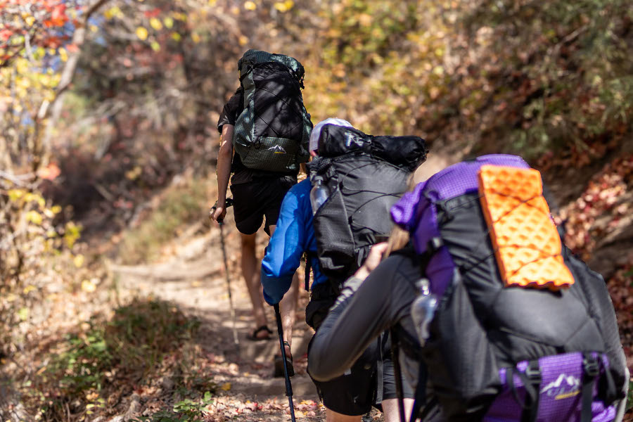 Friends hiking wearing Robic Circuit SVs